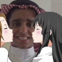 A man wearing a traditional ghutra being kissed on both cheeks by two anime girls.