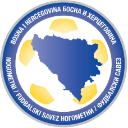 Football Association of Bosnia and Herzegovina crest featuring a blue map on a white soccer ball background.