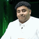 Man making a series of faces and giving a sarcastic thumbs-up gesture.