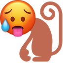 A brown monkey with a bright orange face, sweating with a blue drop and sticking its tongue out in a flustered expression.