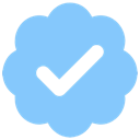 A light blue scalloped badge with a white checkmark inside.