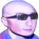 A bald man wearing dark sunglasses with a smug, cool expression.