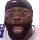 Man with wide eyes and open mouth expressing extreme shock and excitement.