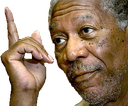 Morgan Freeman pointing his index finger upward with a serious expression.