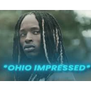 King Von looking with a deadpan expression with the text Ohio Impressed overlaid in blue.