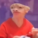 Person with a heavily distorted, warped face looking slightly to the side.