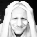 Person clutching their head with a distorted, panicked facial expression in black and white.