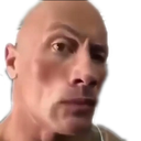 Dwayne The Rock Johnson giving an intense, suspicious side-eye stare.