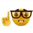 Nerd emoji with thick brown glasses and buck teeth holding up one finger to make a point.