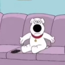 Brian Griffin sitting on a purple couch with a blank, confused expression.