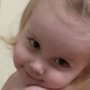 Chloe looking sideways with a skeptical and judgmental facial expression.