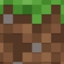 Grass block from Minecraft with green top and brown dirt sides.