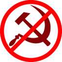 A red prohibition circle with a diagonal line over a dark red hammer and sickle symbol.