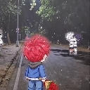 Chibi anime boy with red hair stands on a dark street holding a bouquet of red roses.