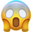 Yellow face with wide white eyes and an open mouth in a look of extreme shock.