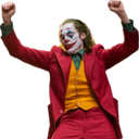 Joker dancing with his arms raised in a red suit on a black background.