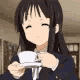 Mio Akiyama from K-On! holding a teacup with a nervous, shaky expression.