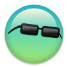 Sunglasses resting on a blue and green gradient orb.