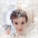 Person with a soft, glowing, and sparkling filter effect around their face.