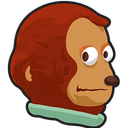 Monkey puppet looking sideways with a nervous and awkward expression.