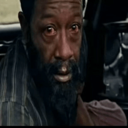 Morgan Freeman with a wide-eyed, shocked expression looking directly at the camera.