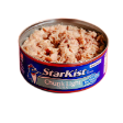 An open can of StarKist Chunk Light tuna sitting on a dark background.