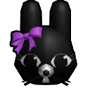 Rattina the rat with a purple bow and wide eyes staring forward.