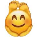 A yellow smiley face with a happy expression leaning back with its feet propped up.