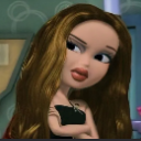 Bratz doll with long brown hair giving a skeptical side-eye with arms crossed.