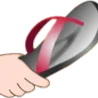 Hand holding a flip-flop in a threatening manner.
