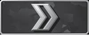 A metallic silver chevron icon pointing to the right on a dark background.