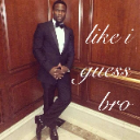 Kevin Hart standing in a tuxedo with the text like i guess bro overlaid.