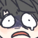 A person with wide, panicked eyes and a shocked expression.