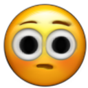 Yellow face with wide, staring eyes and a small, slightly open mouth looking confused and blushing.