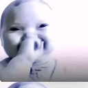 Baby face with a distorted and pixelated expression.