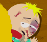 Butters Stotch from South Park with a black eye and bloody nose after being punched.