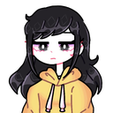 A girl with long black hair wearing a yellow hoodie looking tired and unimpressed.