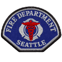 Seattle Fire Department patch featuring a red Rod of Asclepius on a blue background.