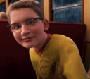 Know-It-All boy from The Polar Express wearing glasses and looking at the camera with a smug, condescending expression.