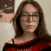 A person with glasses blowing a kiss in a multi-frame animation.