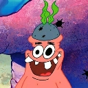 Patrick Star with a wide, manic grin and a rock on his head.