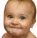 Baby with a cheeky, tight-lipped smirk and wide eyes.