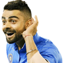 Virat Kohli cupping his hand to his ear with a wide-eyed, curious expression.