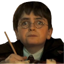Harry Potter looking wide-eyed and worried while wearing his signature round glasses.