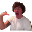 Man making a dramatic hand gesture to signal silence with an open mouth.