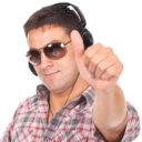 Man wearing sunglasses and headphones giving a thumbs up gesture.
