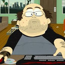 Gamer from South Park sitting at a computer desk typing intensely.