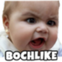 Baby with a distorted, intense expression and open mouth.