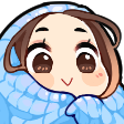 A cute character with brown hair wrapped in a blue blanket with a happy, blushing expression.