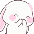 A cute white bunny with pink cheeks blushing and covering its mouth with its paws.